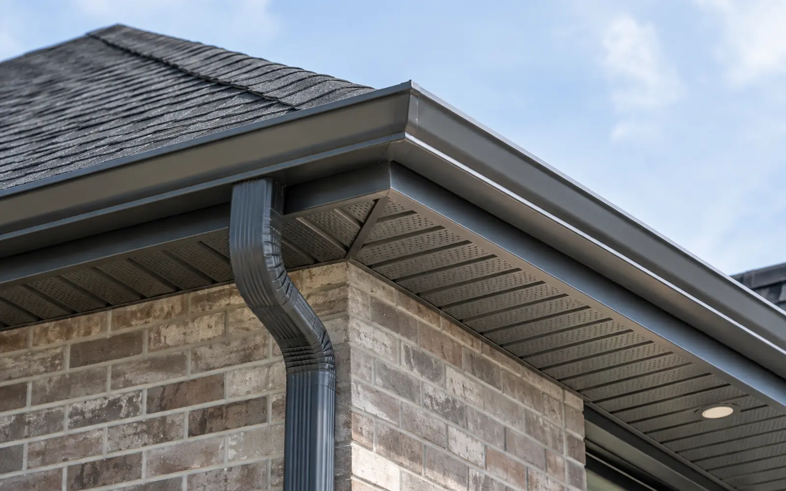 Coordinated eavestrough, downspout, soffit and fascia detail